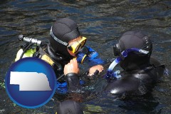 nebraska map icon and a scuba diving lesson in Monterey Bay, California